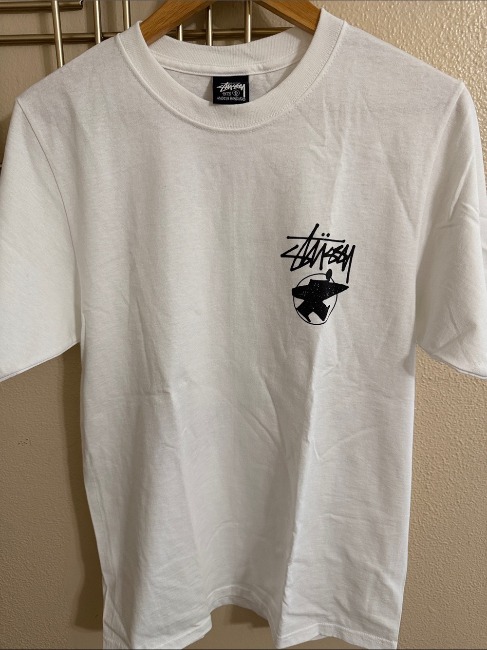 Stussy White T-Shirt with Black Logo Pocket Graphic
